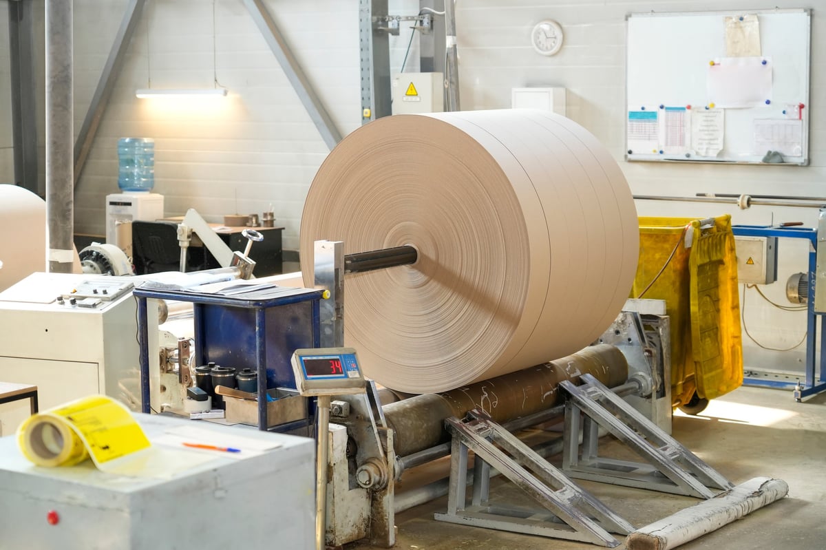 Industrial kraft paper roll in a manufacturing plant